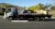2008 Isuzu NPR Flatbed Tow Truck - Image 2